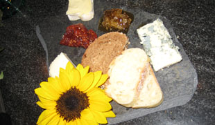 Fresh fruit platter with brie and a gorgonzola cheese